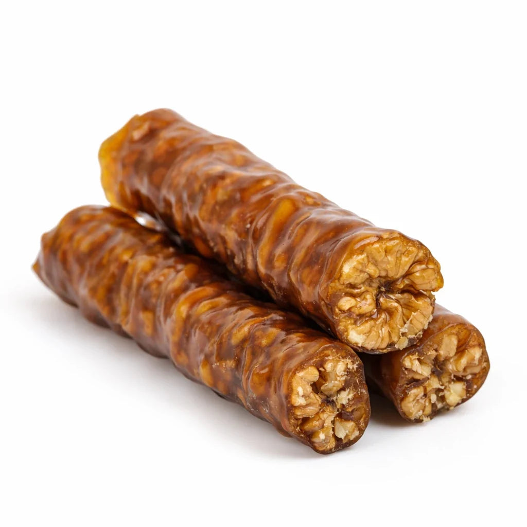 Han Bey Kayısı Üzüm Pekmezli Bol Cevizli Sucuk, doğal üzüm pekmezi ve bol ceviz içiyle geleneksel yöntemlerle hazırlanan premium kalite Malatya yöresel lezzeti.